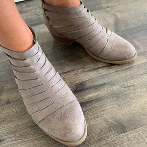 Gray strappy ankle boots with a little heel